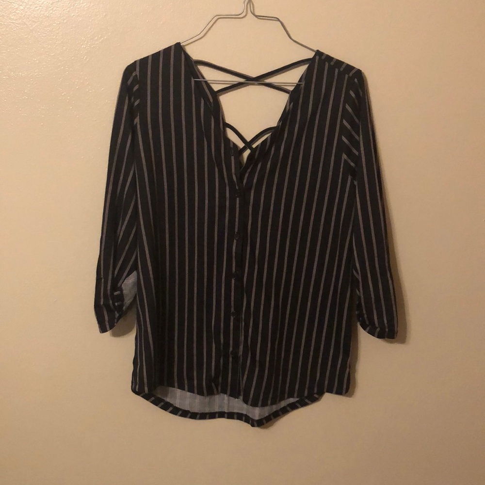 Button up with a cross over in the back